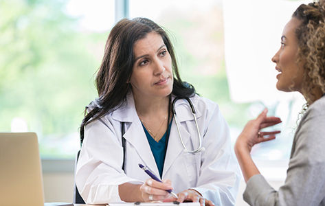 Woman discusses health care.