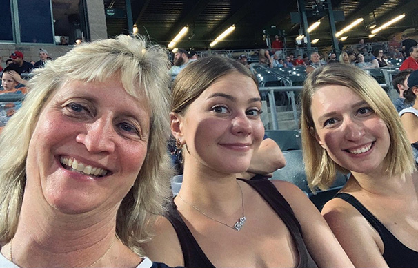 Erika, right, with her mom and sister.