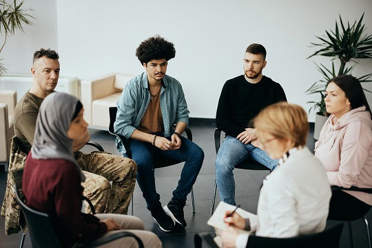 A photo of participants in group-based therapy.