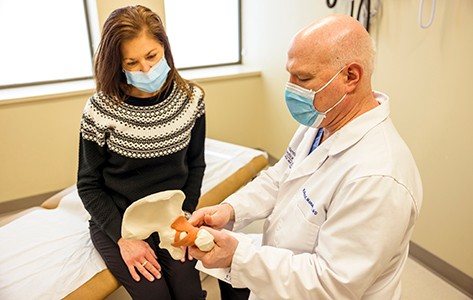 Dr. Moaco and patient 