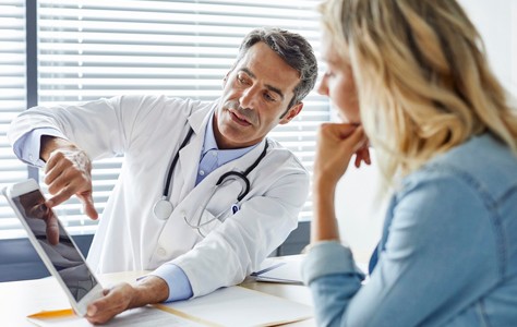 doctor explaining sarcoma disease to patient