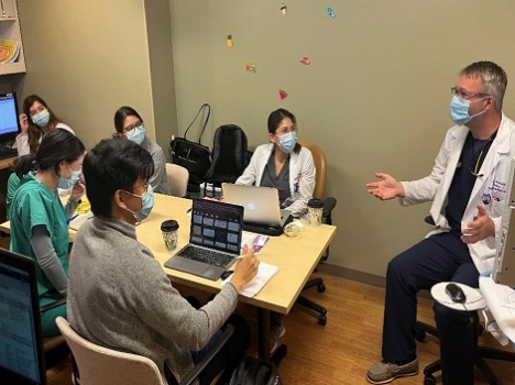 A picture of Dr. White with residents.